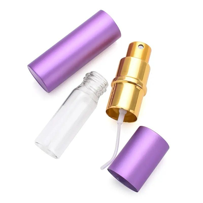 7756c5ae-346f-4e12-a10f-13e520f5d44b Perfumero Metálico 5ml Rosca Morado
